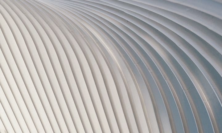 wavy white building facade