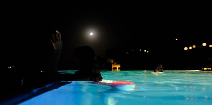 night pool with moon reflection
